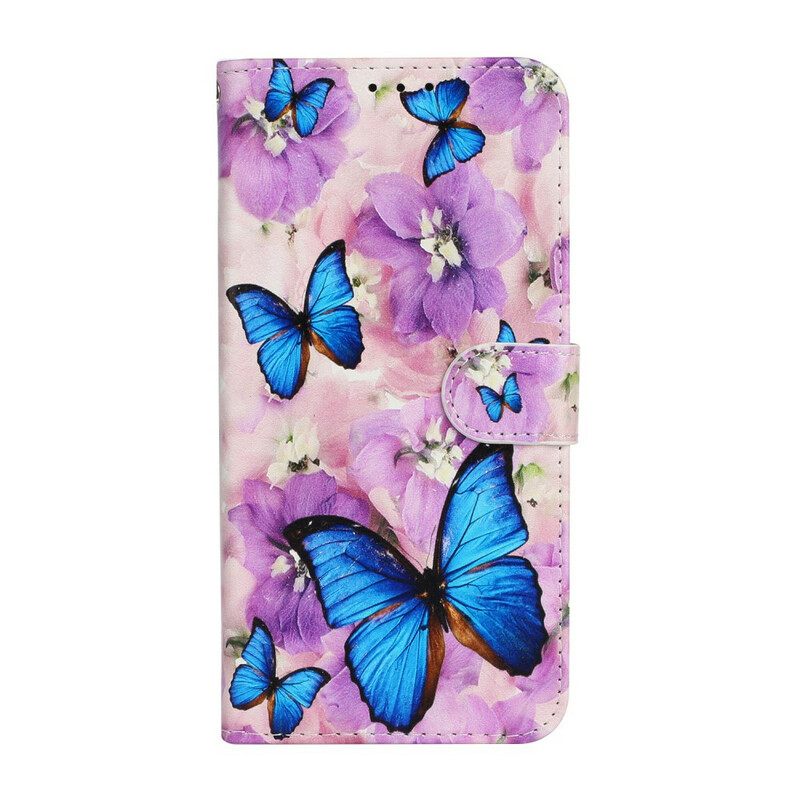 Nahkakotelo iPhone 13 Mini Sinisiä Perhosia Kukissa