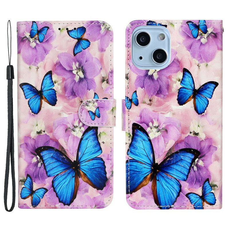 Nahkakotelo iPhone 13 Mini Sinisiä Perhosia Kukissa